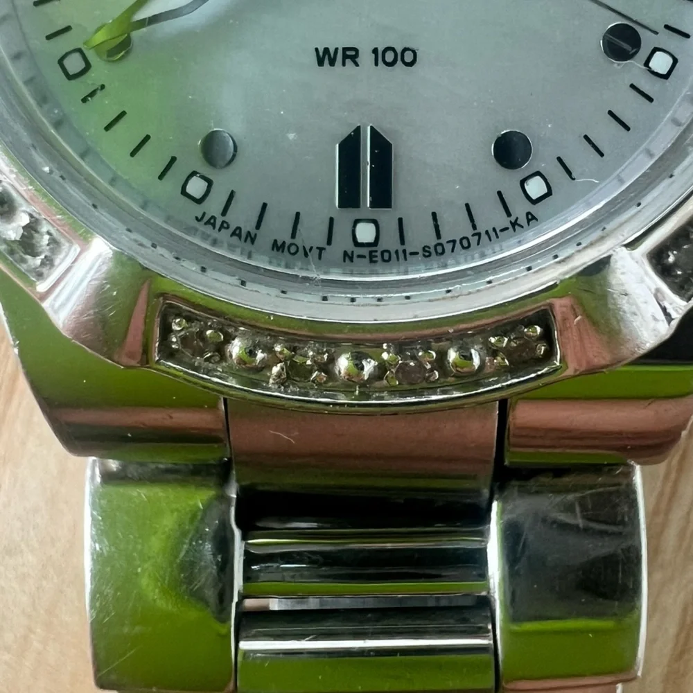 Citizen eco-drive ladies silver tone diamond solar dress watch